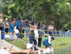 Unila dan Forpimawa Tanam Pohon dan Tebar Benih Ikan di Embung Rusunawa